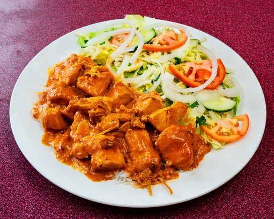 Butter Chicken with Rice and Salad.